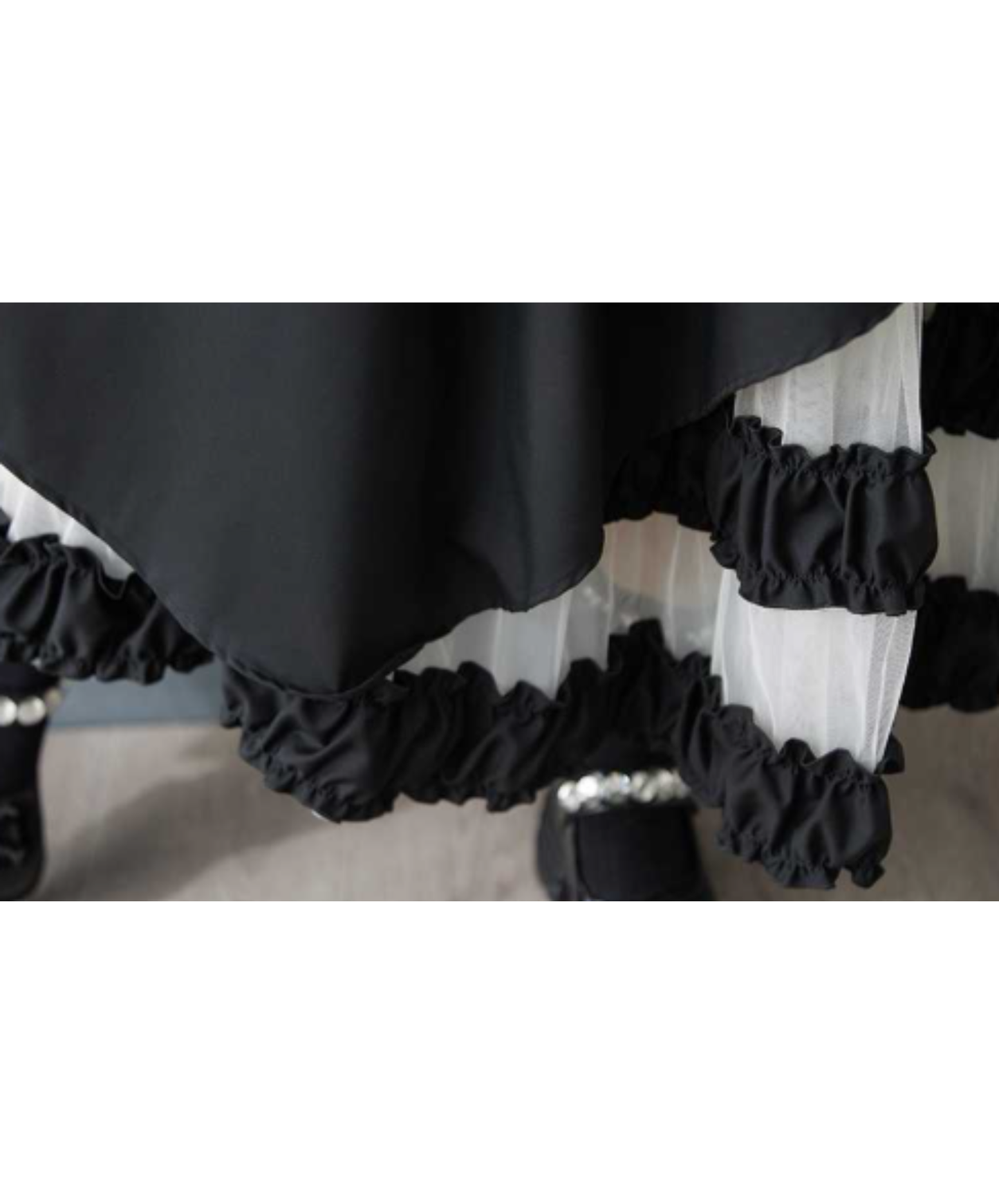 asymmetric style combining tulle and ruffles skirt EN3058
