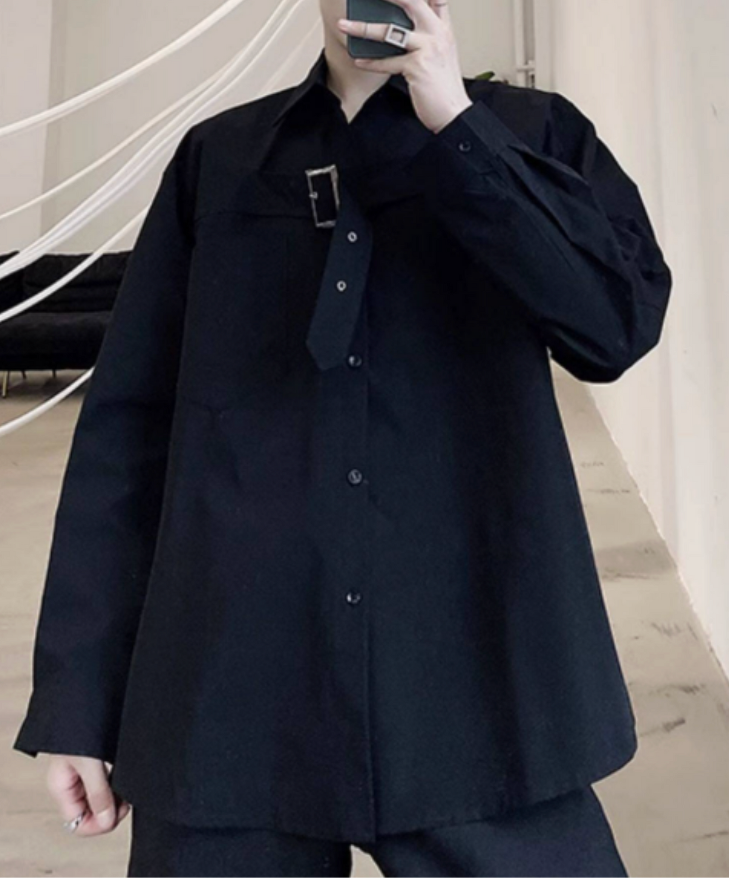 chest area decorated with a wide belt. shirt EN2750