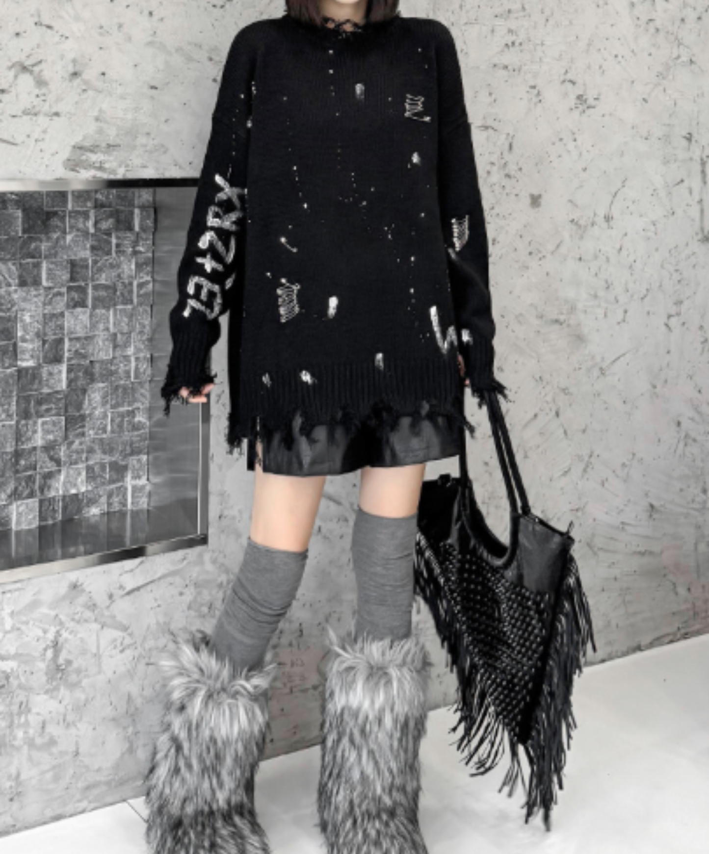 spliced design with heavy distressing sweater EN3124