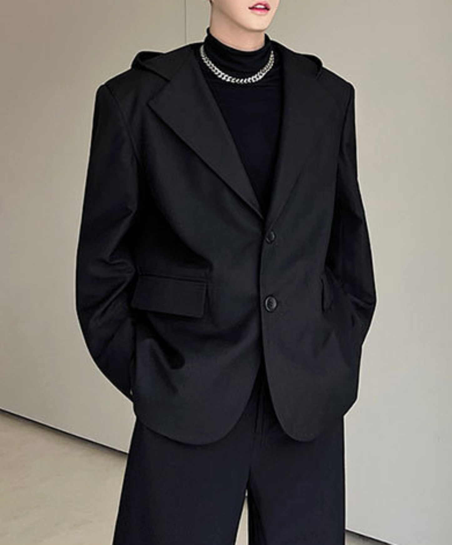 dark hooded jacket EN1857