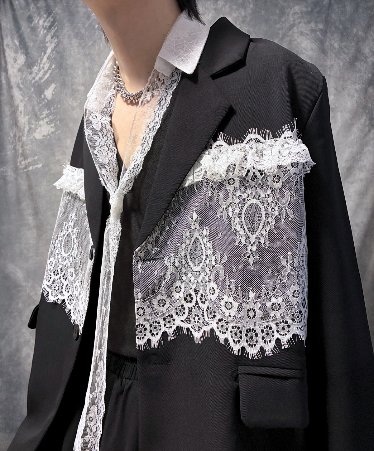 panelled design with a lace bow tie jacket EN3166