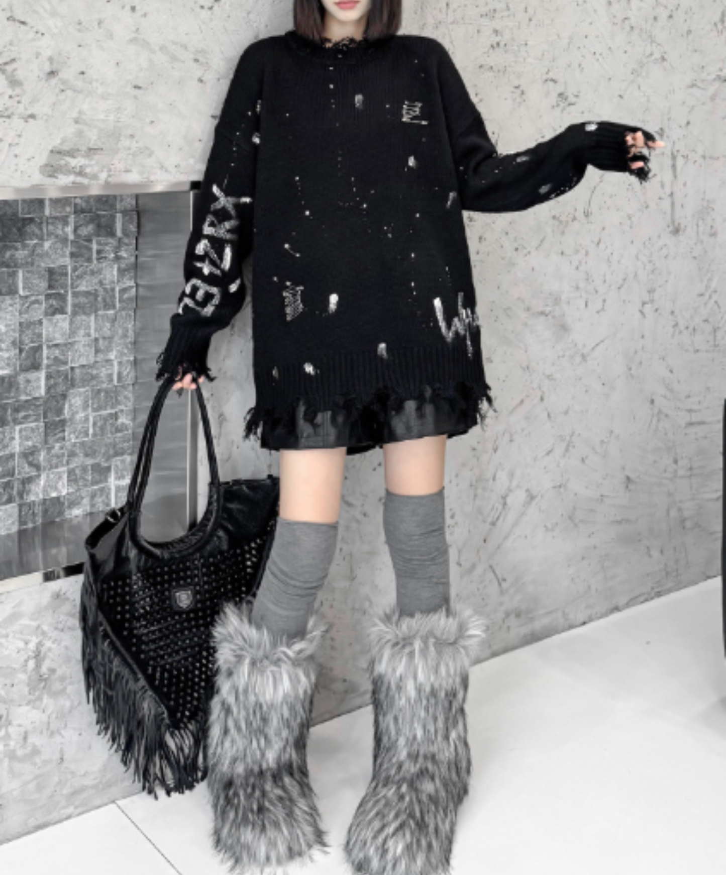 spliced design with heavy distressing sweater EN3124