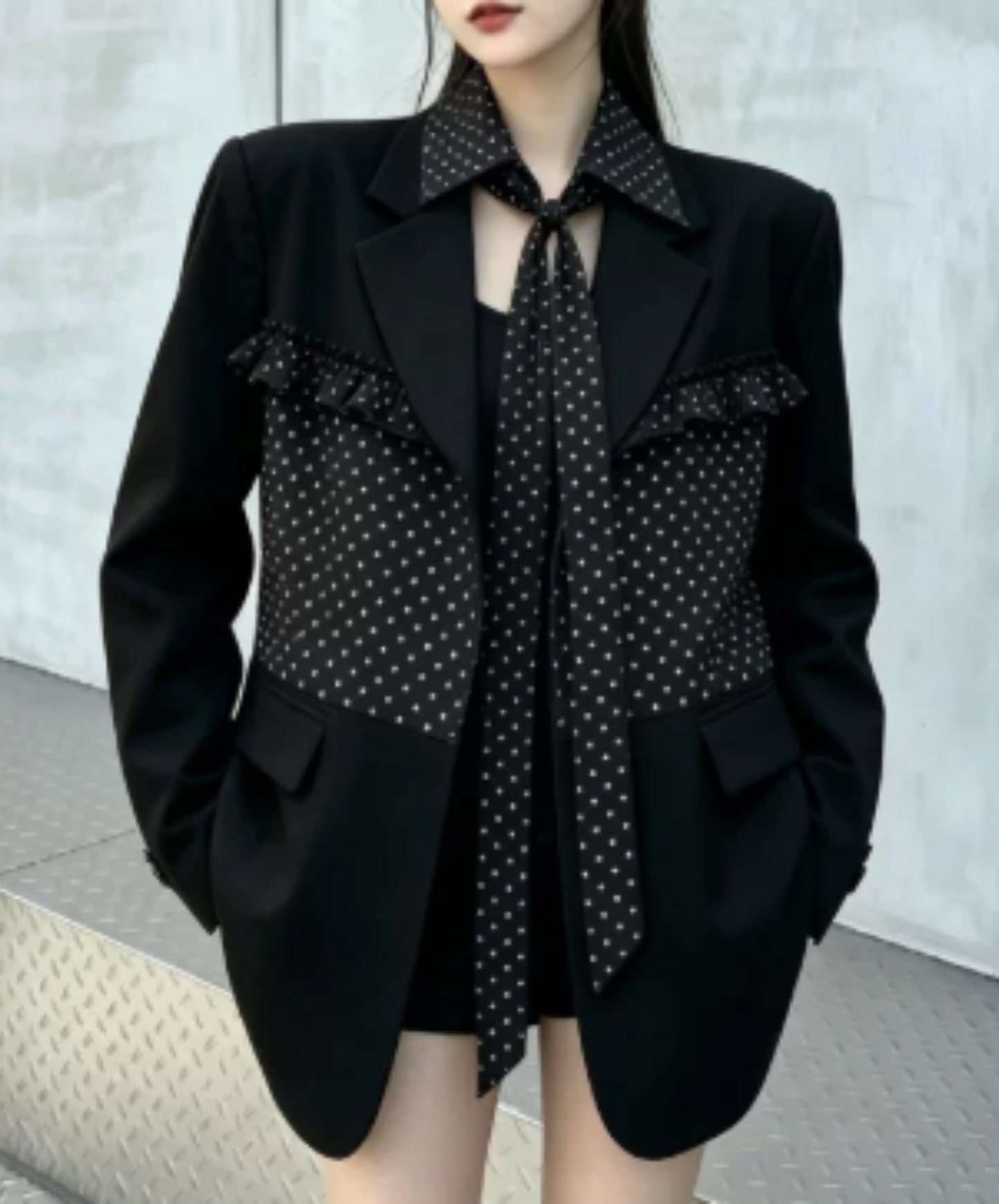ruffle detail with a polka-dot bow tie jacket EN3167