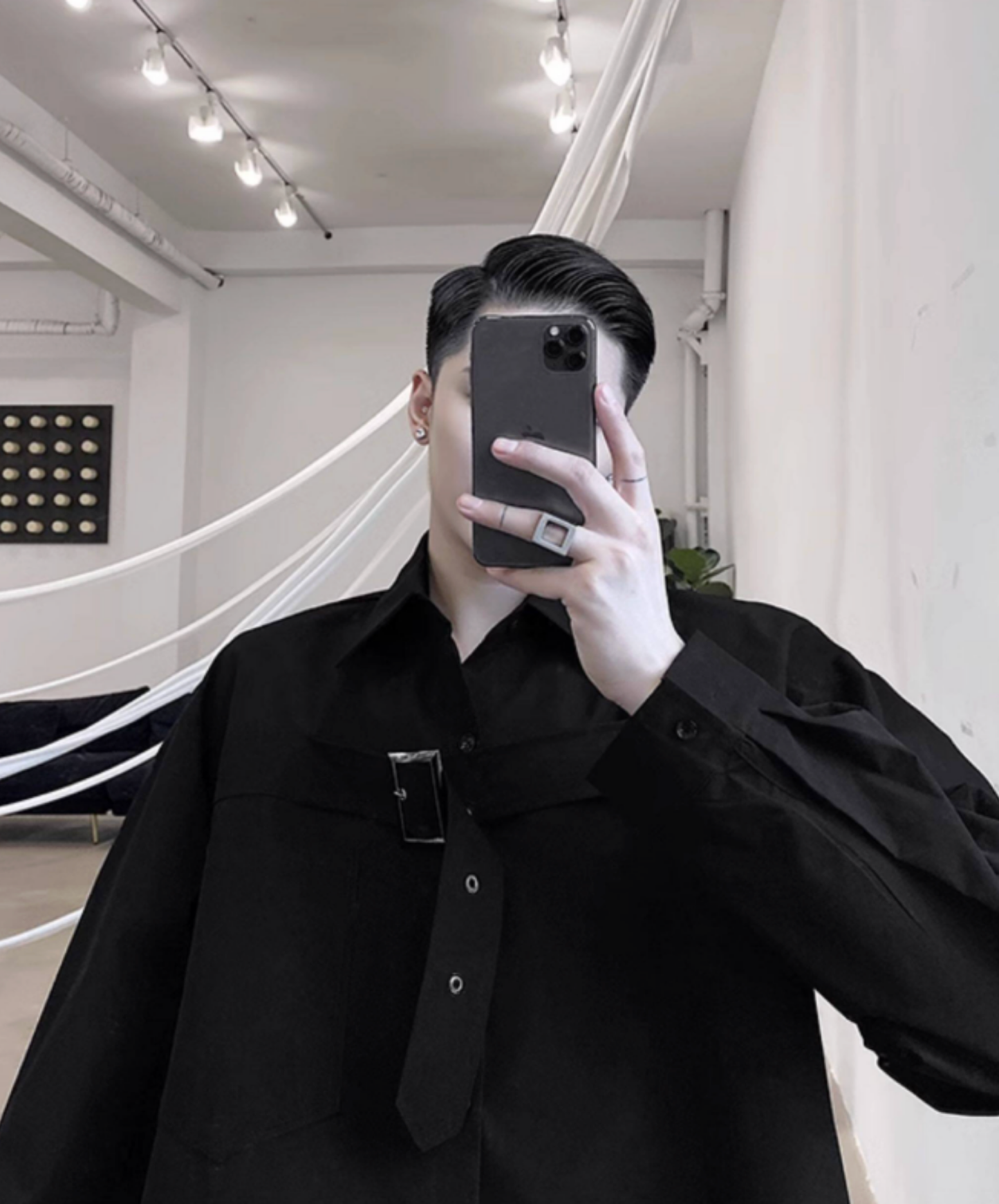 chest area decorated with a wide belt. shirt EN2750