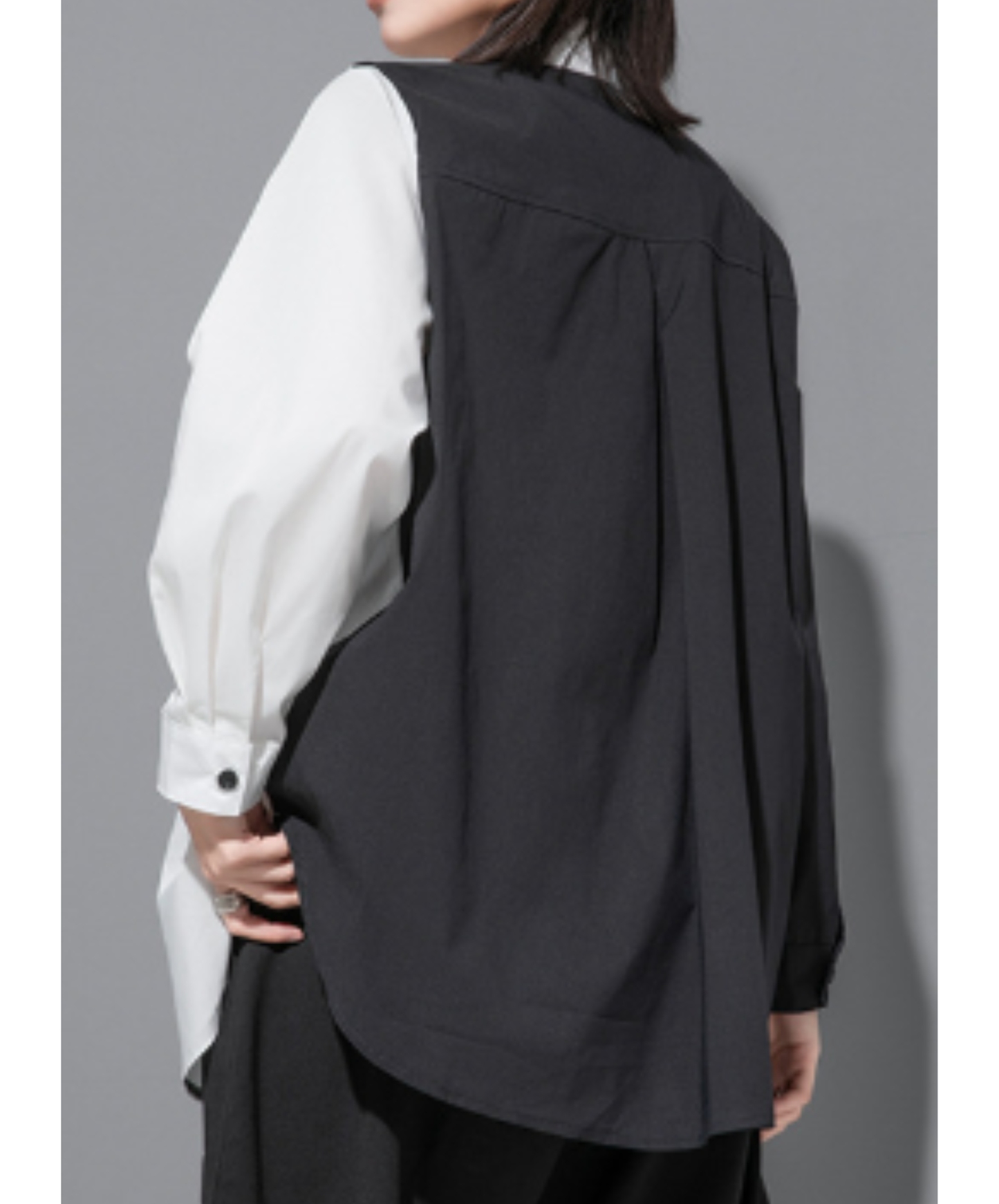 Includes a faux-layered vest shirt EN3118
