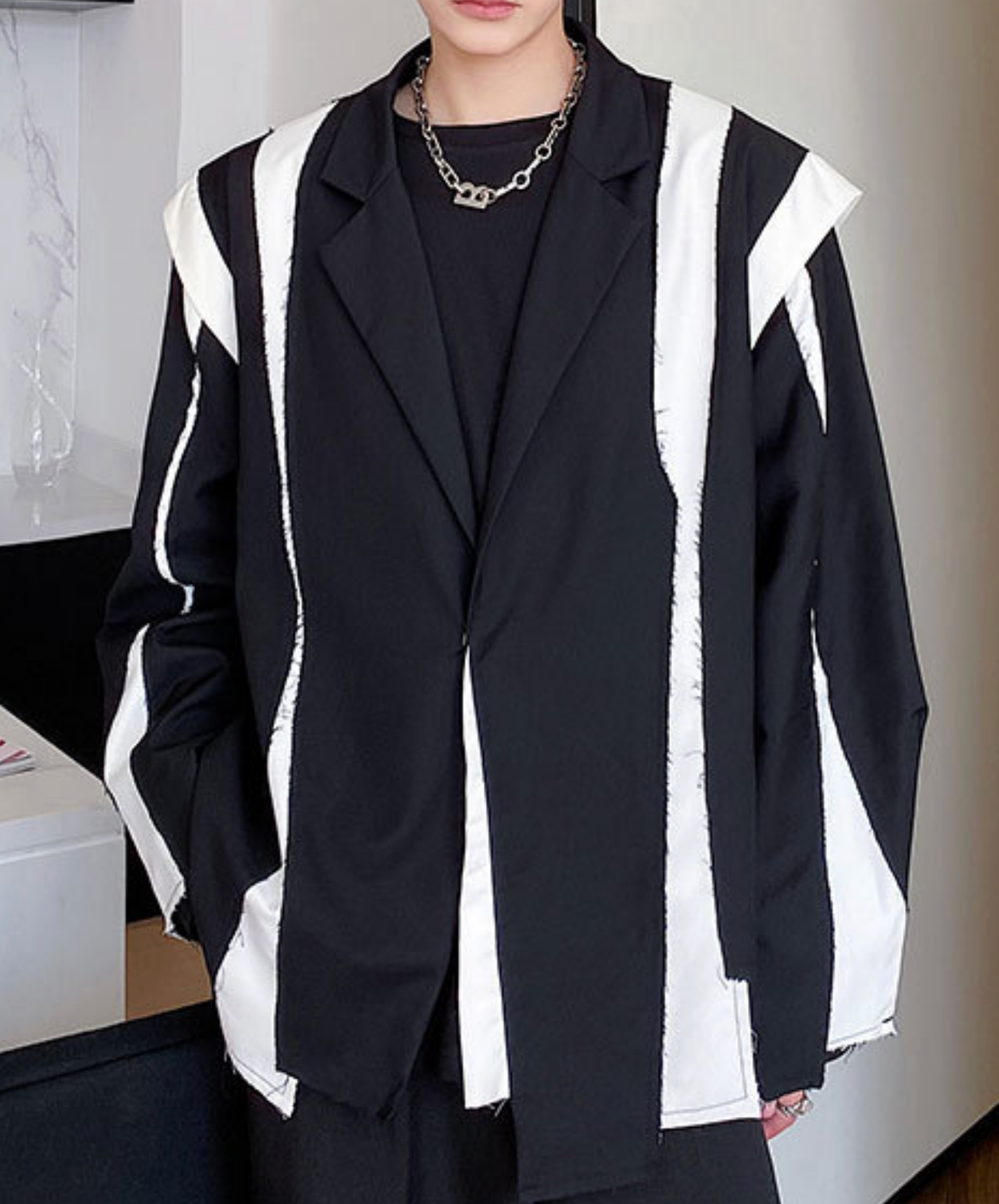 monotone patchwork with fuzzing jacket EN2695