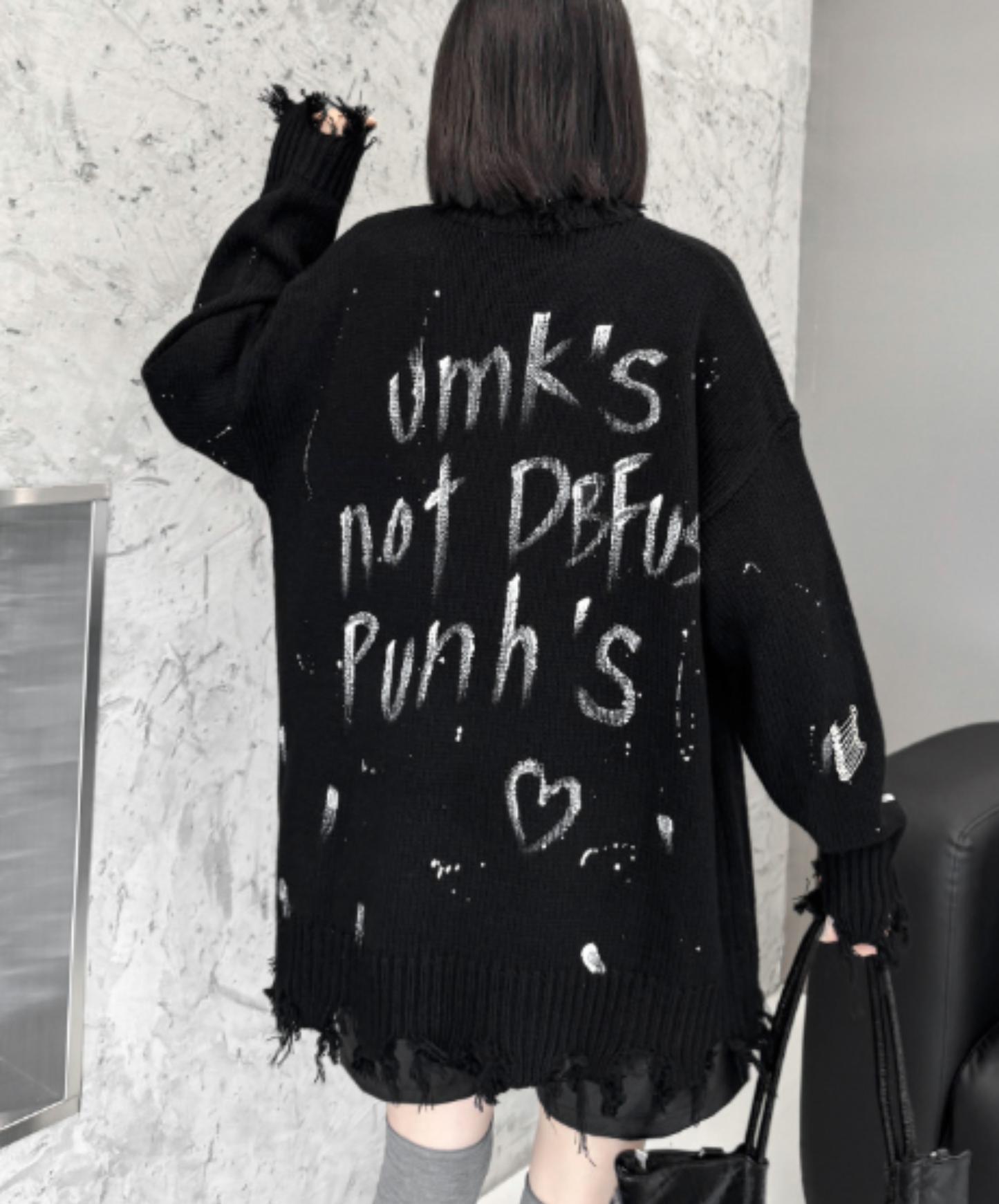 spliced design with heavy distressing sweater EN3124