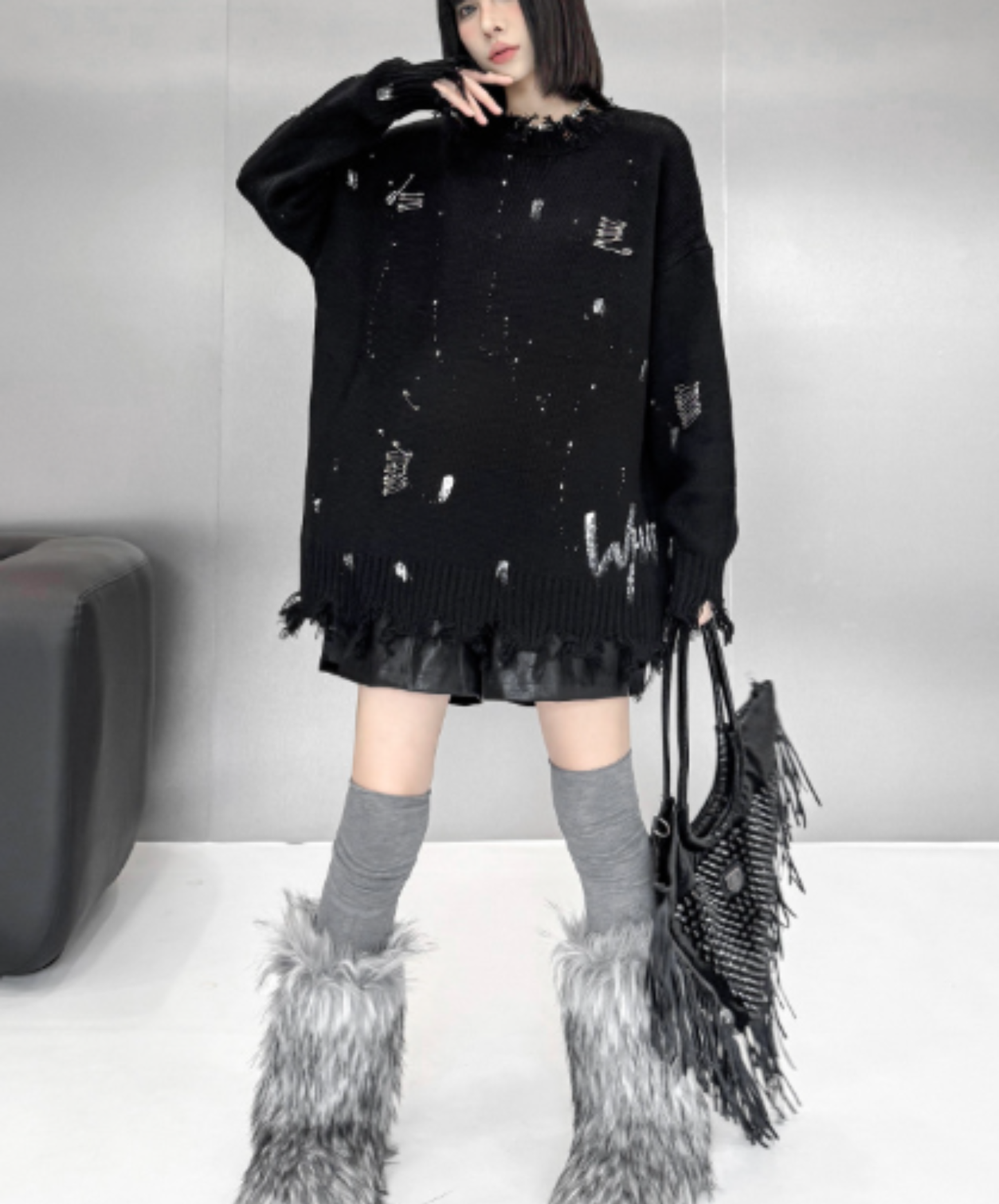 spliced design with heavy distressing sweater EN3124