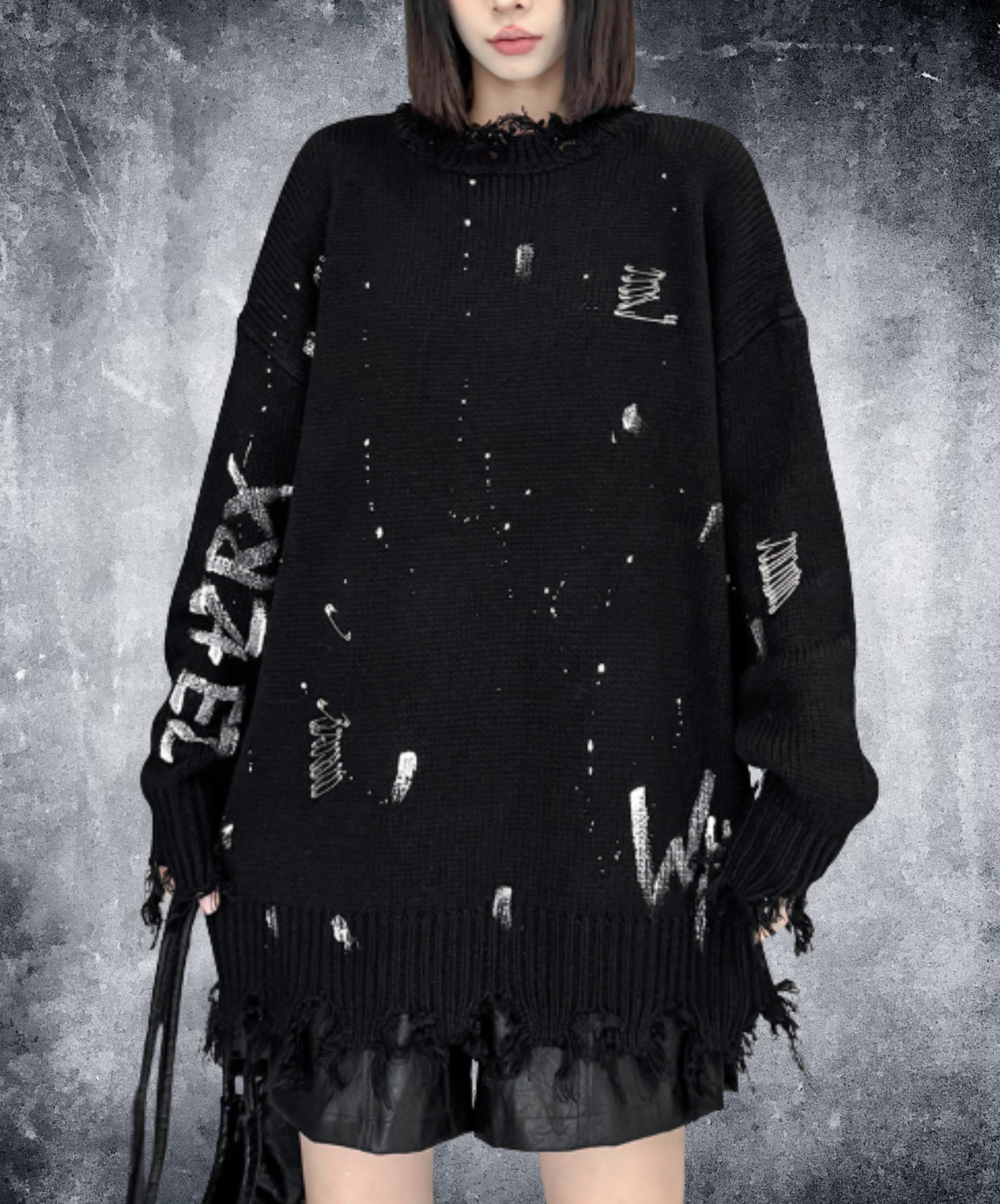 spliced design with heavy distressing sweater EN3124