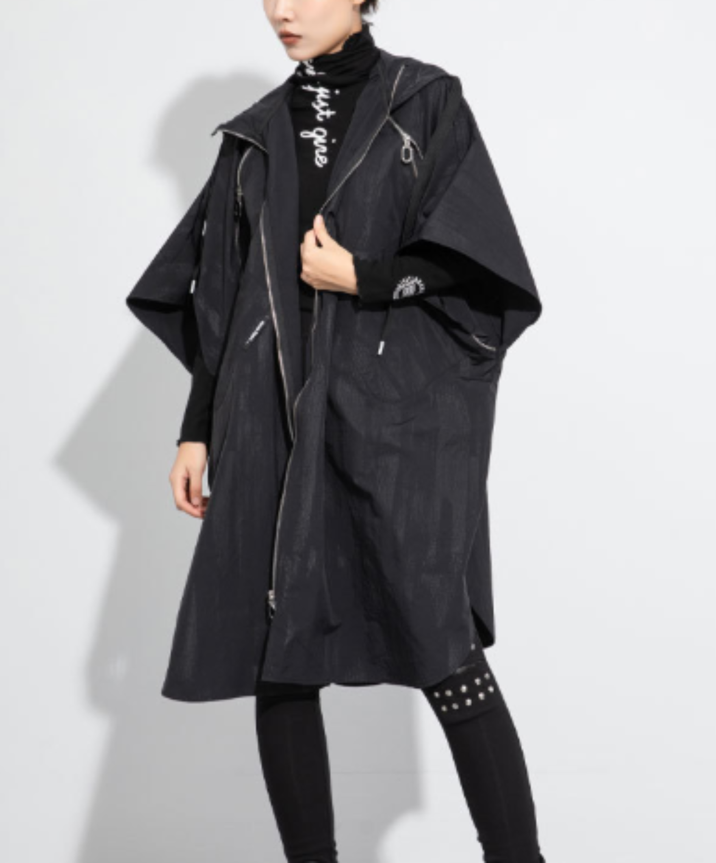 poncho-style design with a zipper hoodie EN3063