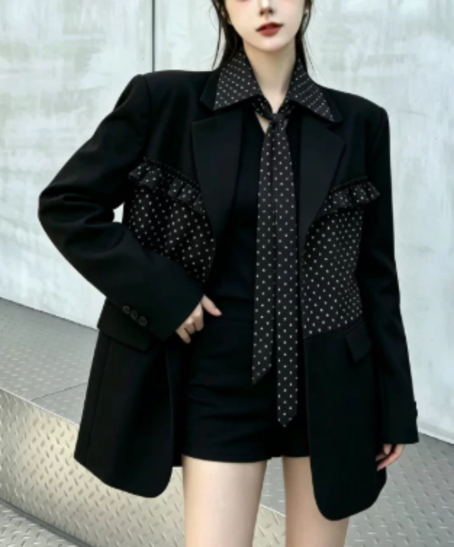 ruffle detail with a polka-dot bow tie jacket EN3167