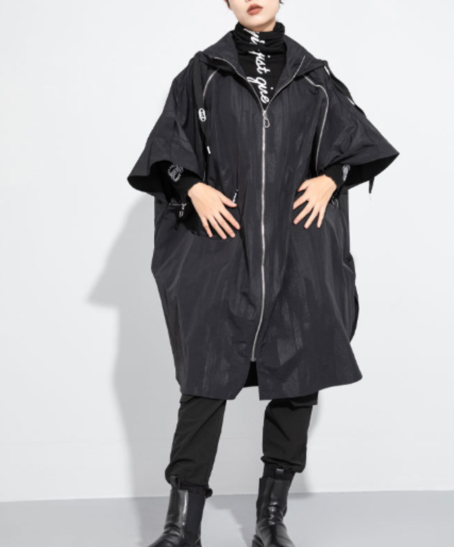 poncho-style design with a zipper hoodie EN3063