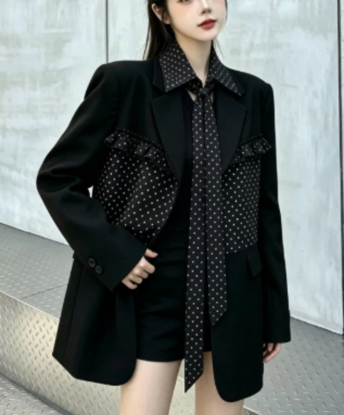 ruffle detail with a polka-dot bow tie jacket EN3167