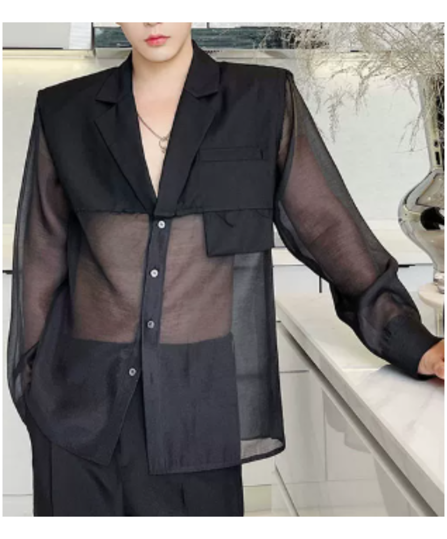 sheer top with a raw-edge design jacket EN2992