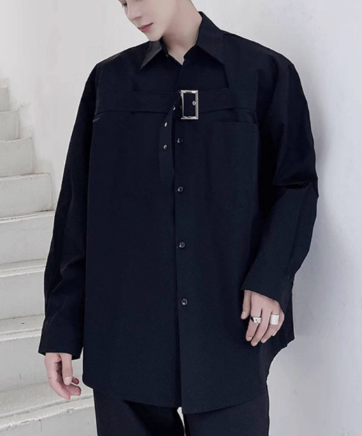 chest area decorated with a wide belt. shirt EN2750