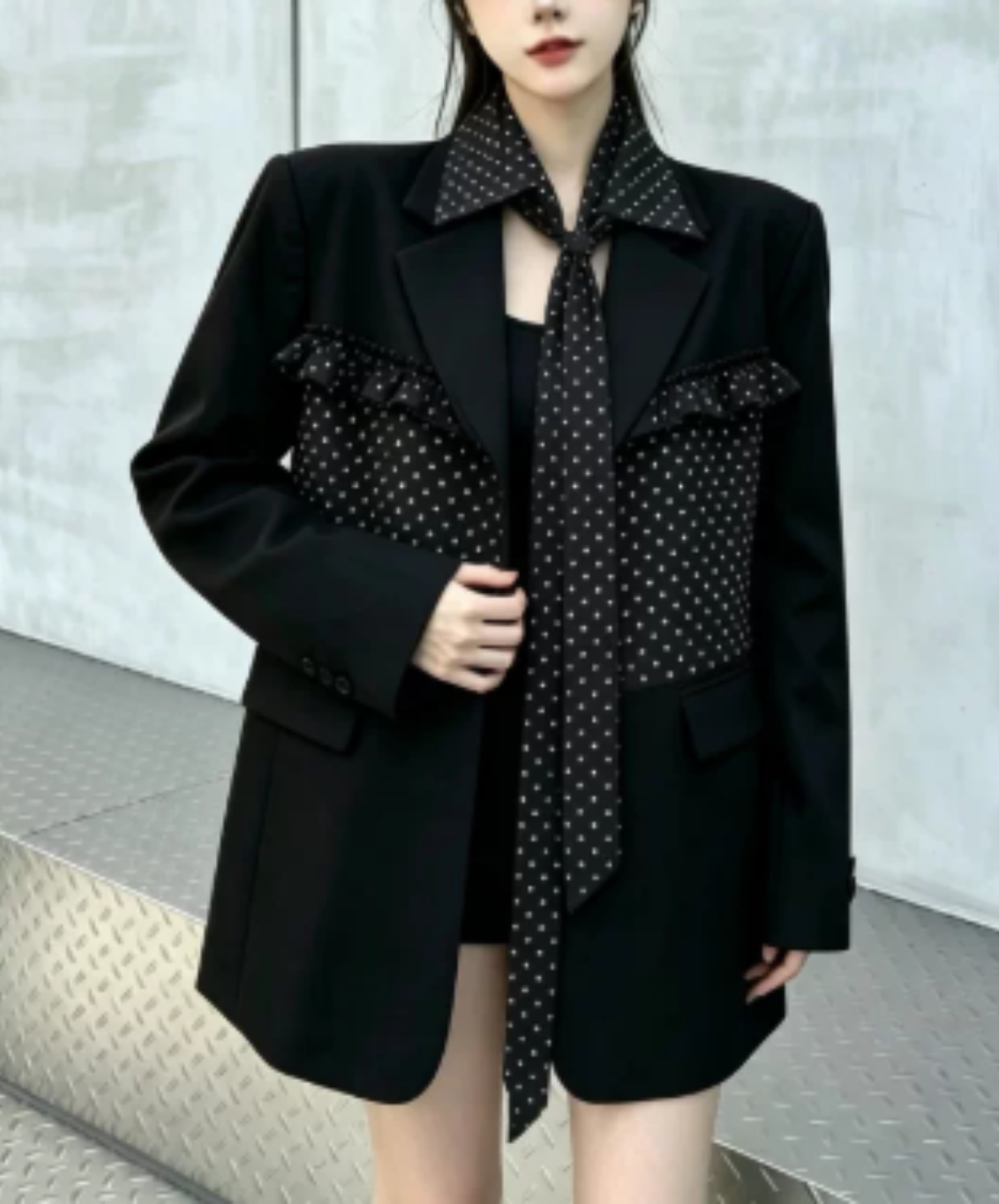 ruffle detail with a polka-dot bow tie jacket EN3167