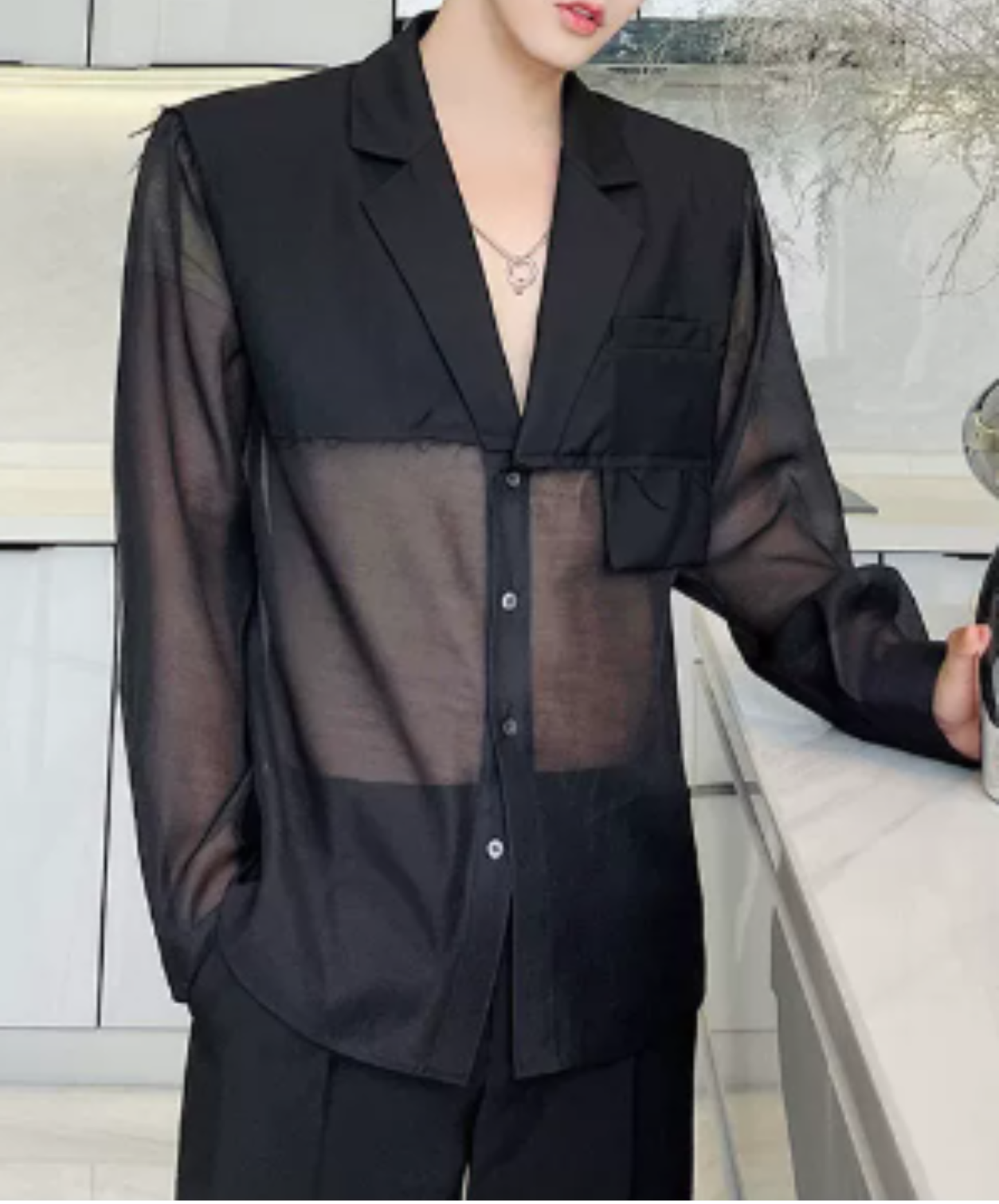 sheer top with a raw-edge design jacket EN2992