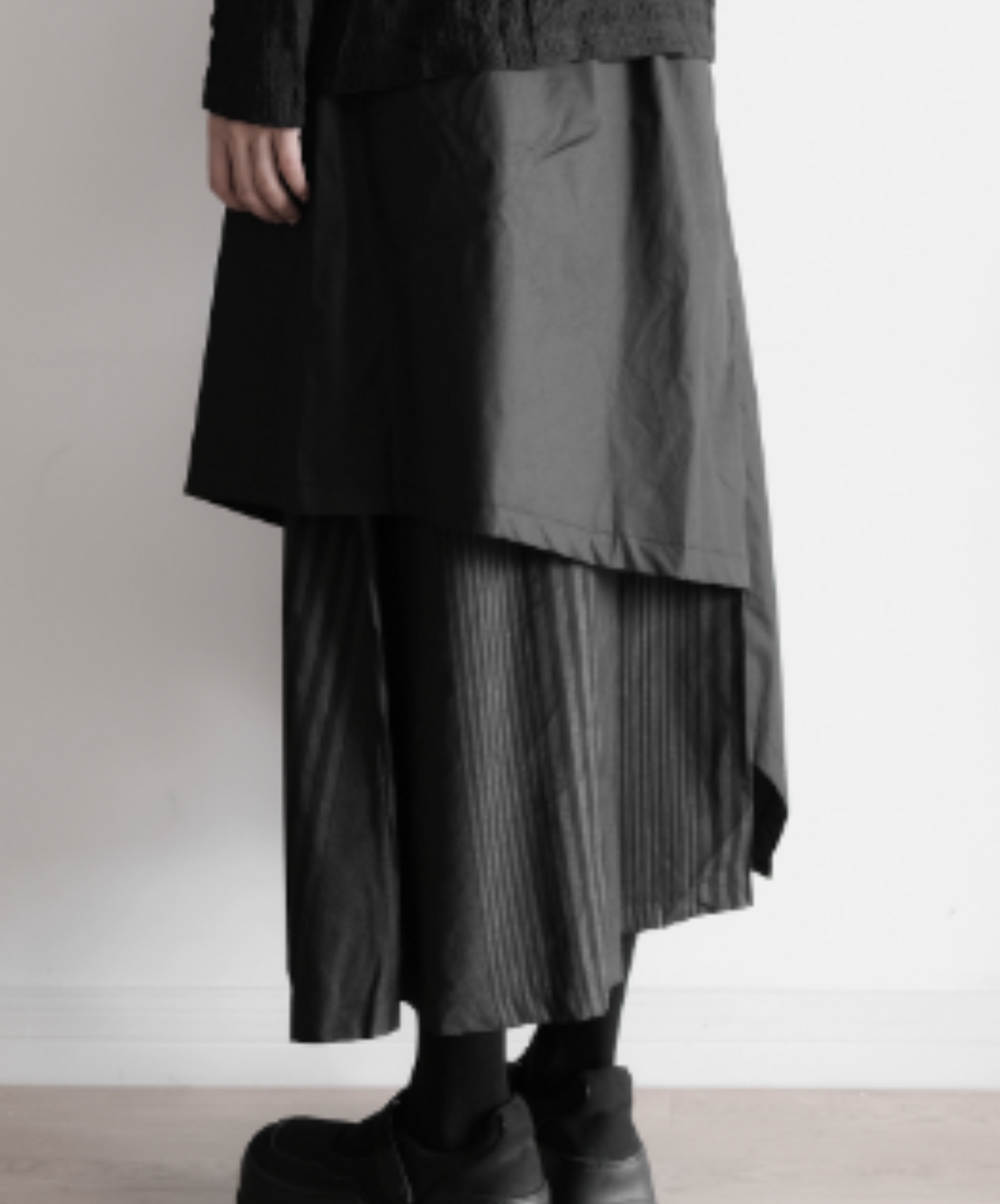 dark irregular asymmetric layered skirt EN1170