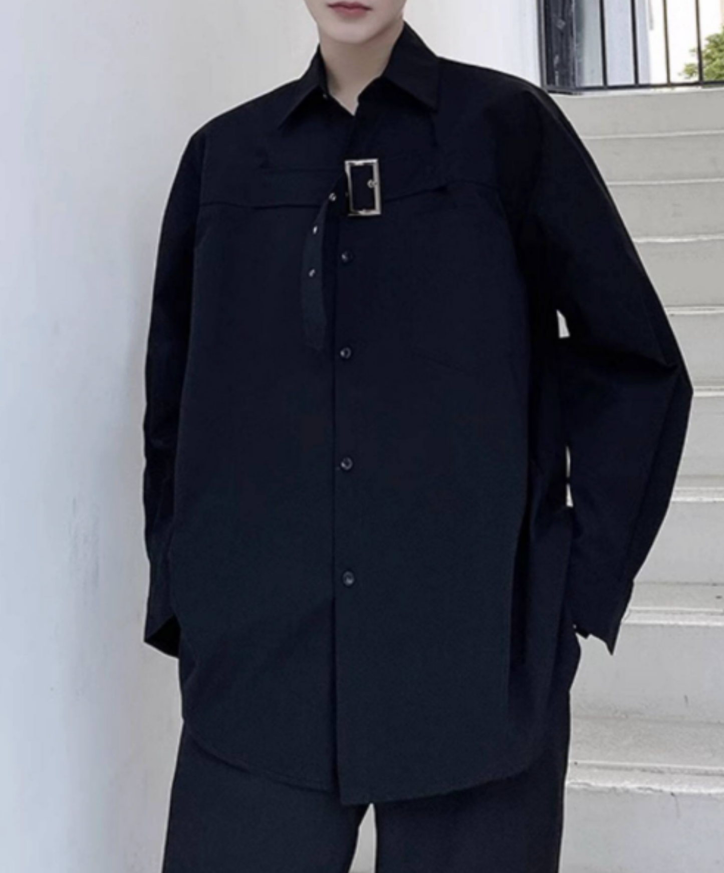 chest area decorated with a wide belt. shirt EN2750