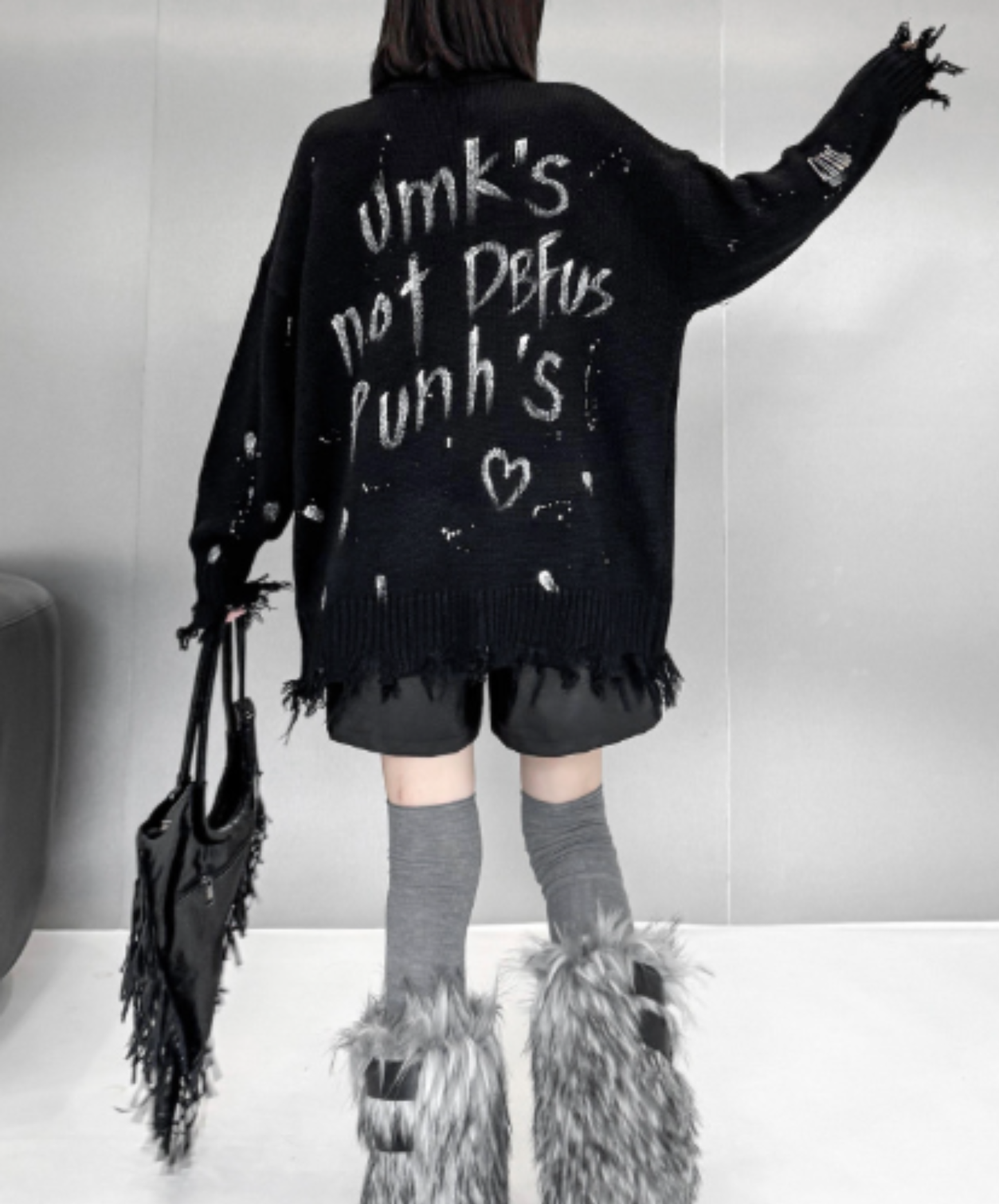 spliced design with heavy distressing sweater EN3124