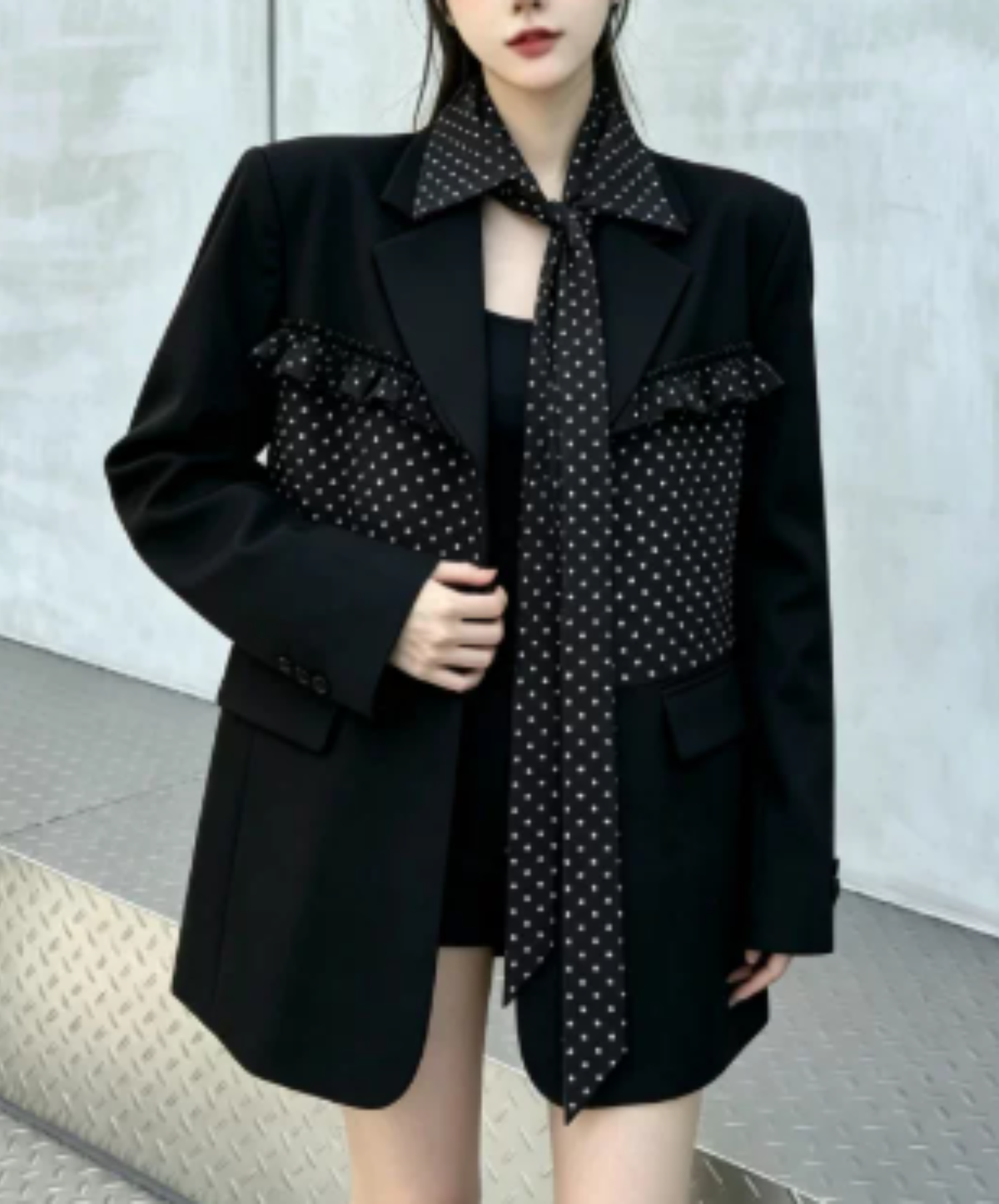 ruffle detail with a polka-dot bow tie jacket EN3167