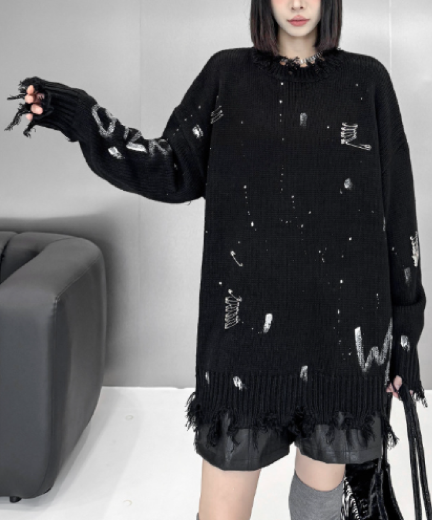 spliced design with heavy distressing sweater EN3124
