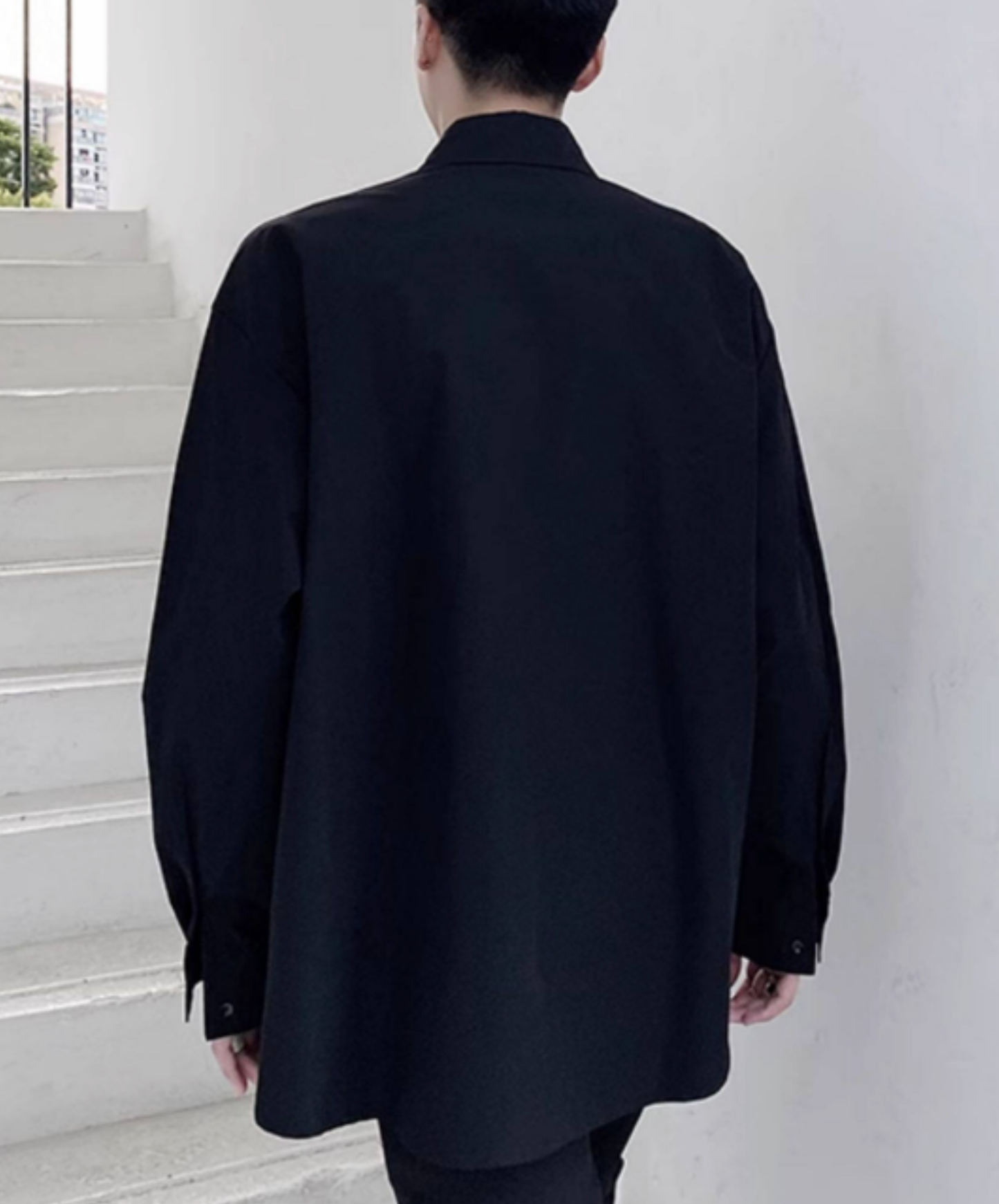 chest area decorated with a wide belt. shirt EN2750