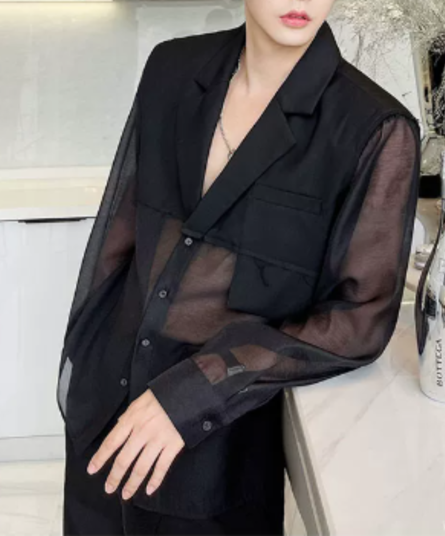 sheer top with a raw-edge design jacket EN2992
