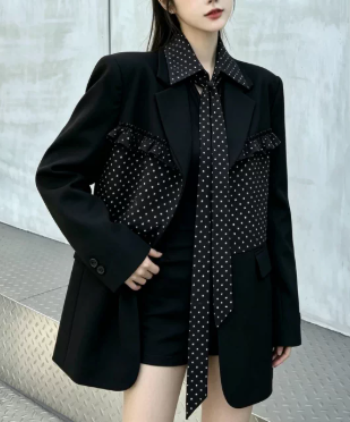 ruffle detail with a polka-dot bow tie jacket EN3167