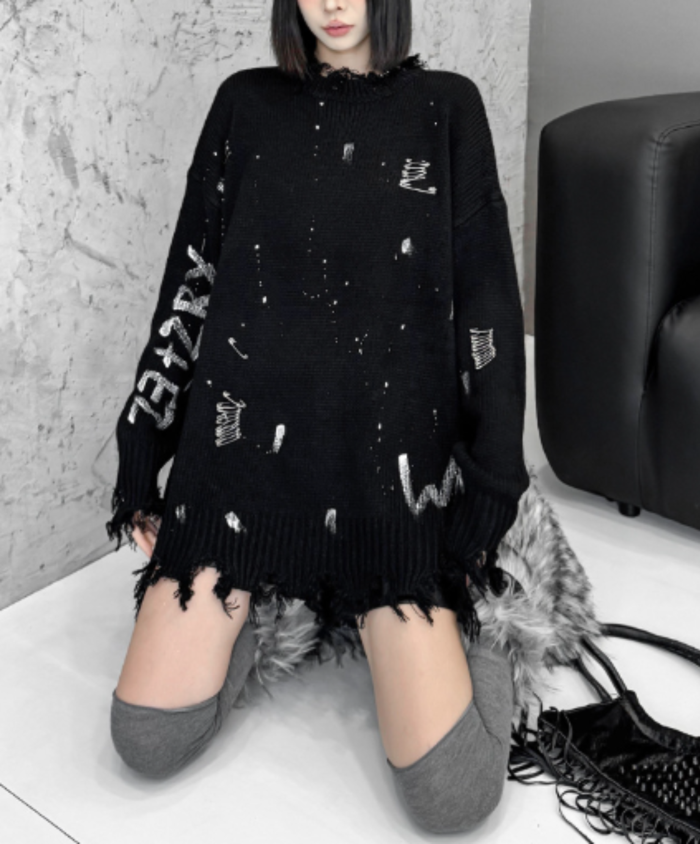 spliced design with heavy distressing sweater EN3124