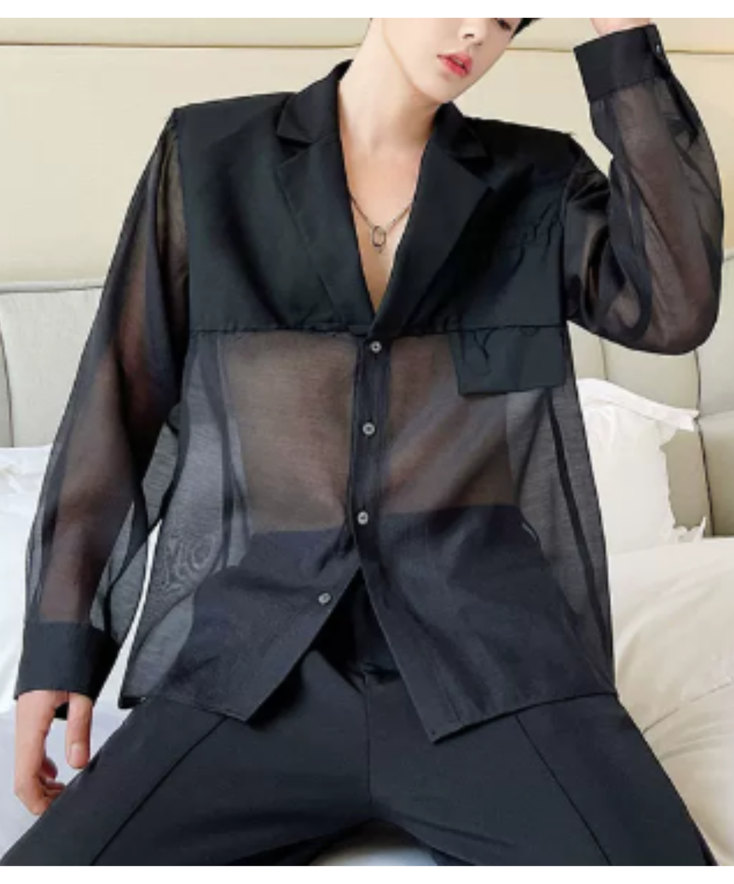 sheer top with a raw-edge design jacket EN2992