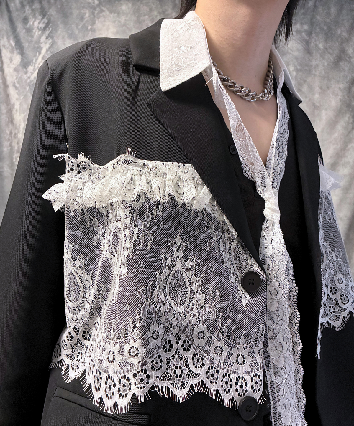 panelled design with a lace bow tie jacket EN3166