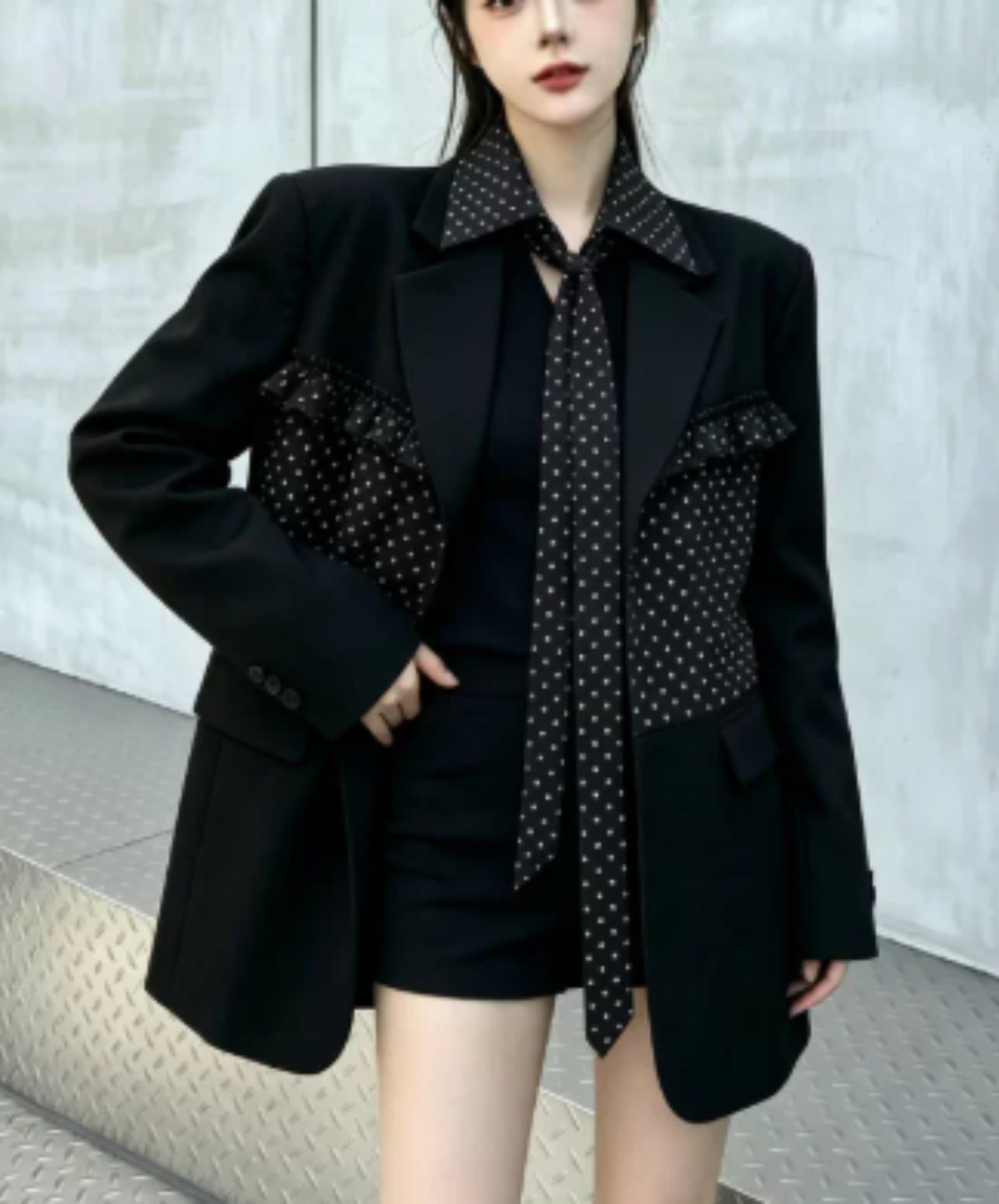 ruffle detail with a polka-dot bow tie jacket EN3167