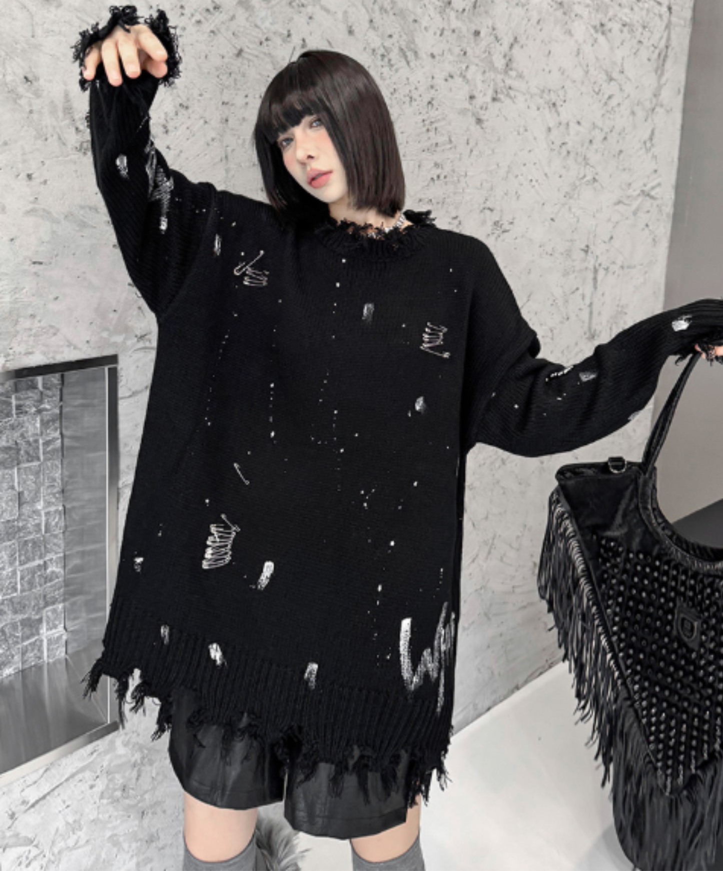 spliced design with heavy distressing sweater EN3124